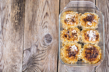 Baked meatballs with rice and vegetables in glass form