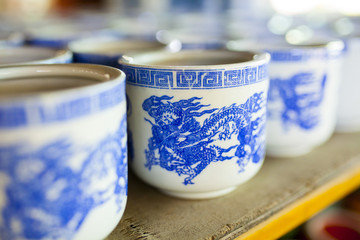 Ceramic cup on a shelf