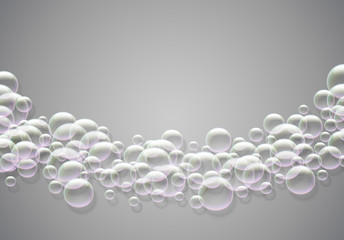 Soap bubbles abstract background with rainbow colored airy foam