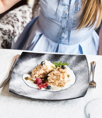 woman eating dessert