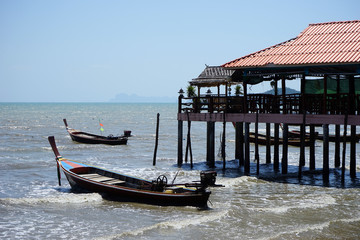 Fishing boats near building