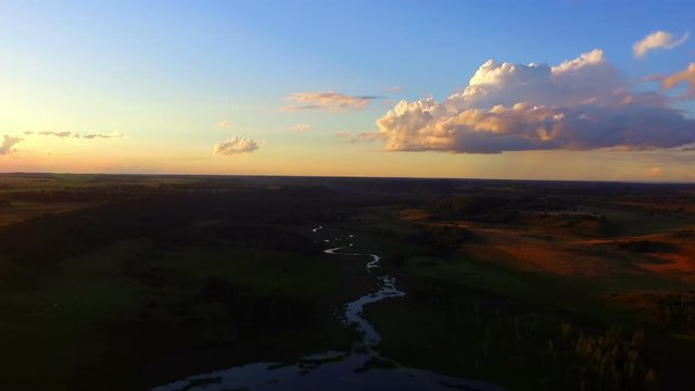 Beautiful view from drone on river and the fields 
