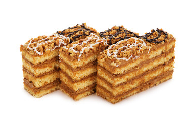peanut cake decorated with cream icing isolated on white