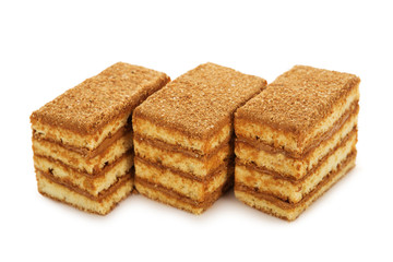honey biscuit cake with condensed milk isolated on white