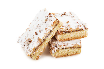 biscuit cake decorated with powdered sugar
