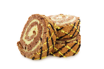 Slices of sweet roll cake isolated on white