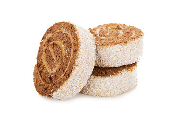 Slices of sweet roll cake isolated on white background