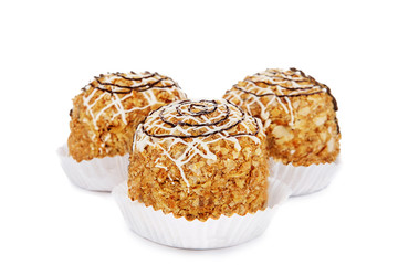 three muffin isolated on a white