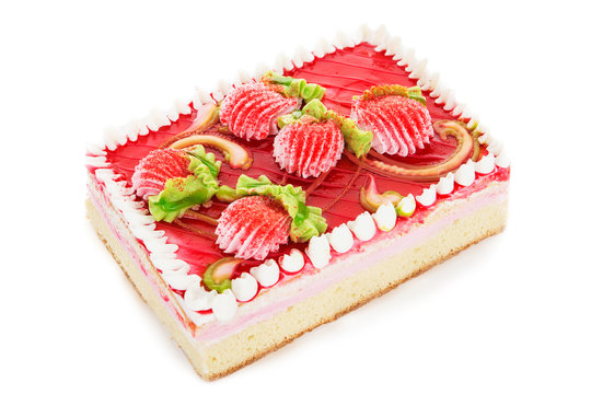 biscuit cake decorated with cream flowers isolated on white