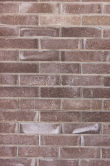 a wall of brown bricks