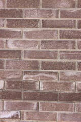 a wall of brown bricks