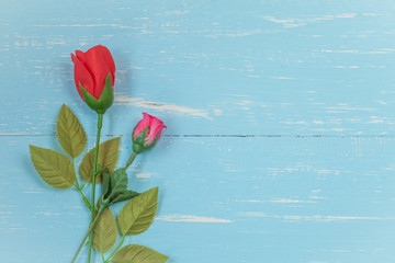 wonderful rose flowers on vintage wood background