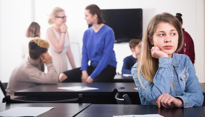 Nice new female student feeling shy at recess