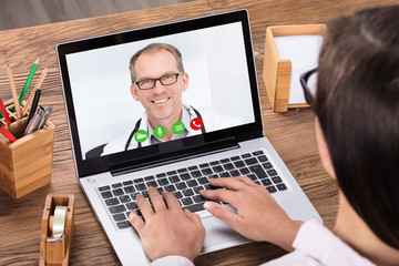 Woman Doing Video Chatting With A Male Doctor