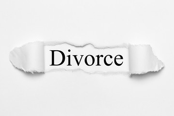 Divorce on white torn paper