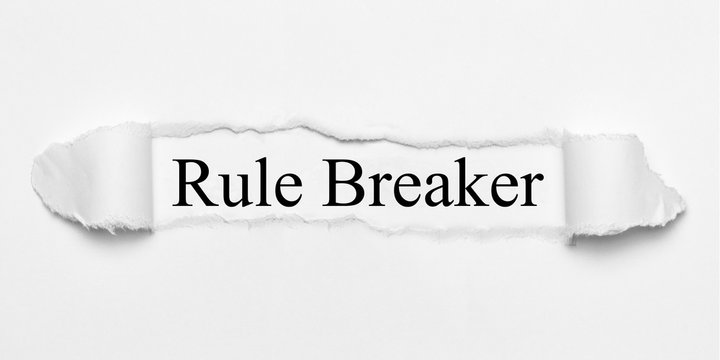 Rule Breaker On White Torn Paper