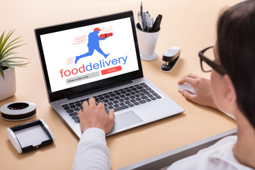 Businesswoman Delivering Food Online