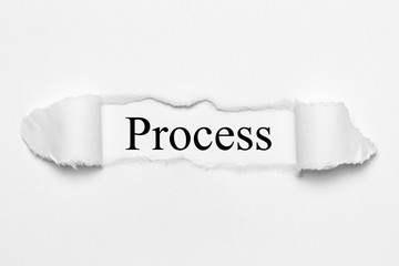Process on white torn paper