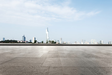 empty floor with cityscape of modern city