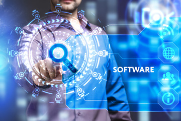 Business, Technology, Internet and network concept. Young businessman working on a virtual screen of the future and sees the inscription: Software