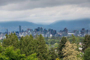 Vancouver Under Storm Clouds From Hills