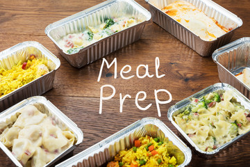 The Word Meal Preparation Written On Table With Takeaway Meals