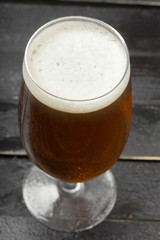 beer glass on a wooden background