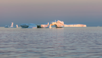 Iceberg in the Disco Bay, Greenland. Their source is by the Jakobshavn glacier. This is a...