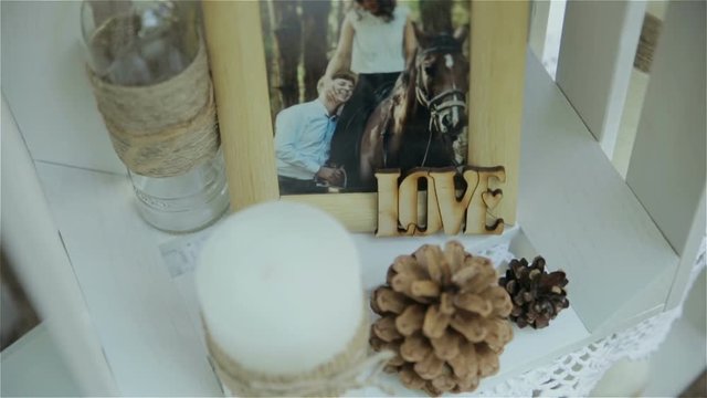 Wedding details. Beautiful flowers decration. Composition wiht candle.