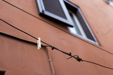 clothespin to hang with typical jalousie in Rome, vintage architecture