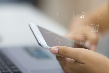 Business woman user using smartphone and laptop for online communication network technology 4.0 internet wireless application mobile with icon web flow, Connect to Internet with phone