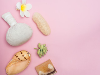 Aromatherapy  product  Spa set ,candle ,soap,coconut,flower,shell,  massage  with  pink color   background .