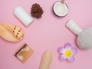 Obraz na płótnie Canvas Aromatherapy product Spa set ,candle ,soap,coconut,flower,shell, massage with pink color background .
