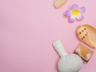 Aromatherapy  product  Spa set ,candle ,soap,coconut,flower,shell,  massage  with  pink color   background .