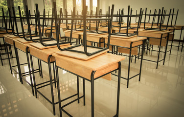 School classroom with desks and chair iron, wood, in high school thailand, vintage tone education concept