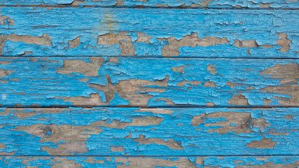 Fototapeta na wymiar Picture of blue, destroyed fence.