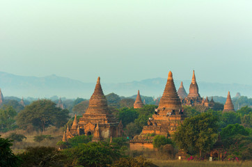 Beautiful Ancient land with thousands of ancient temples, tourists waiting for sunset on ancient Temple in Bagan, Myanmar, color tone effect.