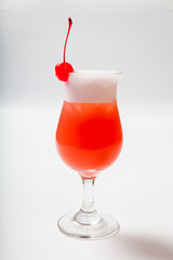 colourful coctail with cherry on the black background
