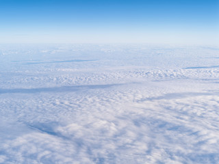 Fototapeta na wymiar clouds. view from the window of an airplane flying above the clouds.
