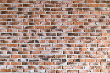 Old grunge brick wall background.
