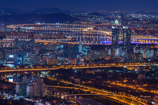 Seoul city and bridge and Han river at night,  South Korea.