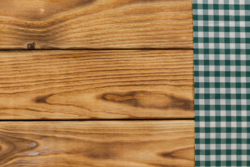 Background with empty wooden table with tablecloth