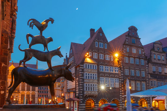 Famous statue of The Bremen Town Musicians, donkey, dog, cat and cockerel, from Grimm's famous fairy tale in the center of Old Town near Bremen City Hall, Bremen, Germany