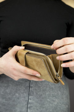 woman holding wallet