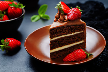 Chocolate cake decorated with strawberries