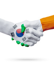 Flags South Korea, Ireland countries, partnership friendship handshake concept.