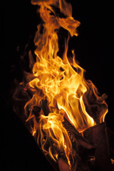 flames on a black background - 144457225