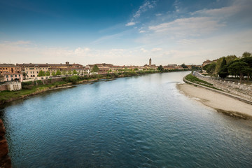Fototapeta premium Verona, Italy. View from medieval stone bridge of Ponte Scaligero, over Adige River, built in 14th century near Castelvecchio