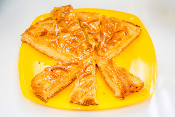 Yellow cake with pieces cut off