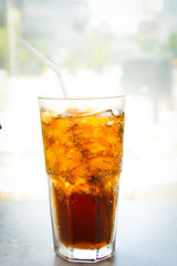 iced cola glass on the table